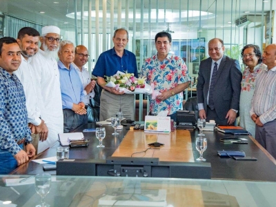 1_From-Right-4-Dr.-H.B.M-Iqbal-Chairman-BoT-receiving-Dr.-Saifur-Rahman-Joseph-Loring-Professor-Virginia-Tech-University-with-flowers